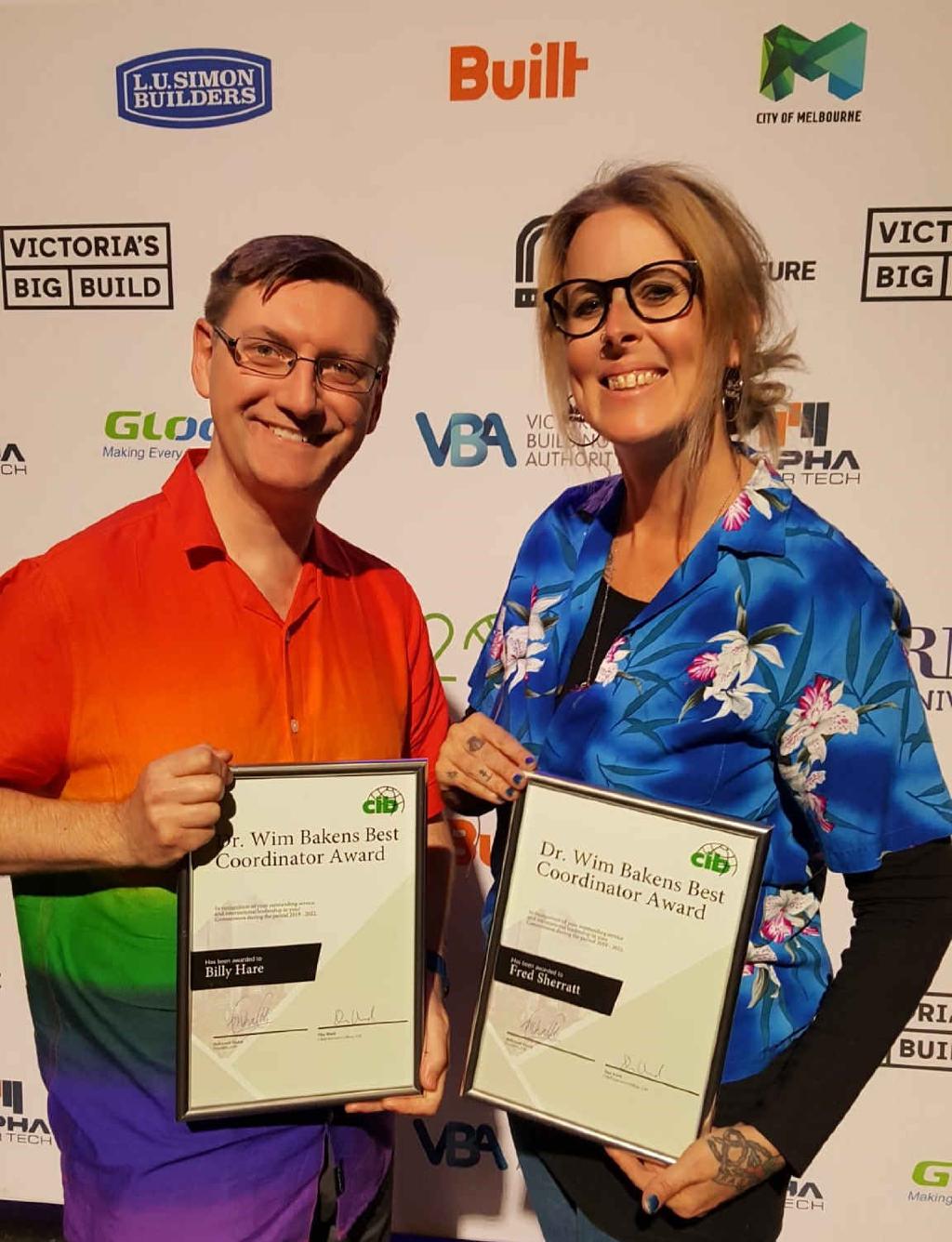 Fred and Billy receive their award in their traditional technicolor!e